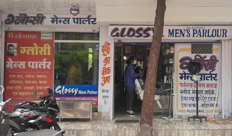 GLOSSY MENS  AND WOMENS PARLOUR 